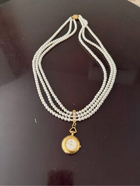 Faberge White Pearl (plastic) Three-Strand Necklace with Gold Pendant Watch